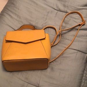 Mini yellow backpack. Gently used.